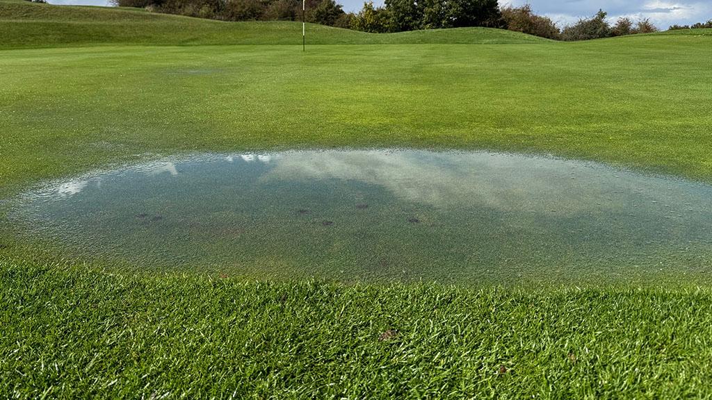 Excess surface water on golf green